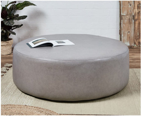 A Black Leather Ottoman Could Be The Perfect Footstool For You