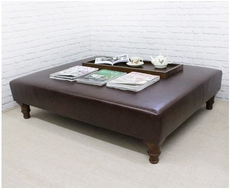 4 Luxury Footstools for Seriously Putting Your Feet Up